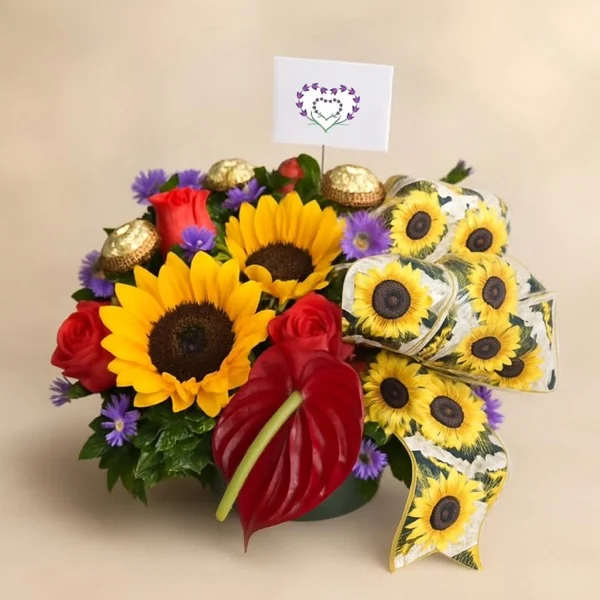 Arreglo de girasoles y rosas rojas con chocolates y cinta de girasoles