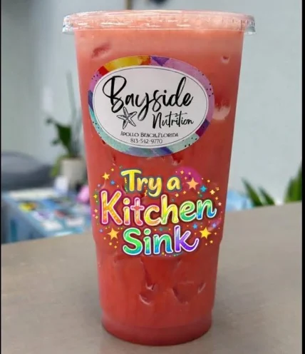 Large pink Kitchen Sink loaded tea in a Bayside Nutrition cup