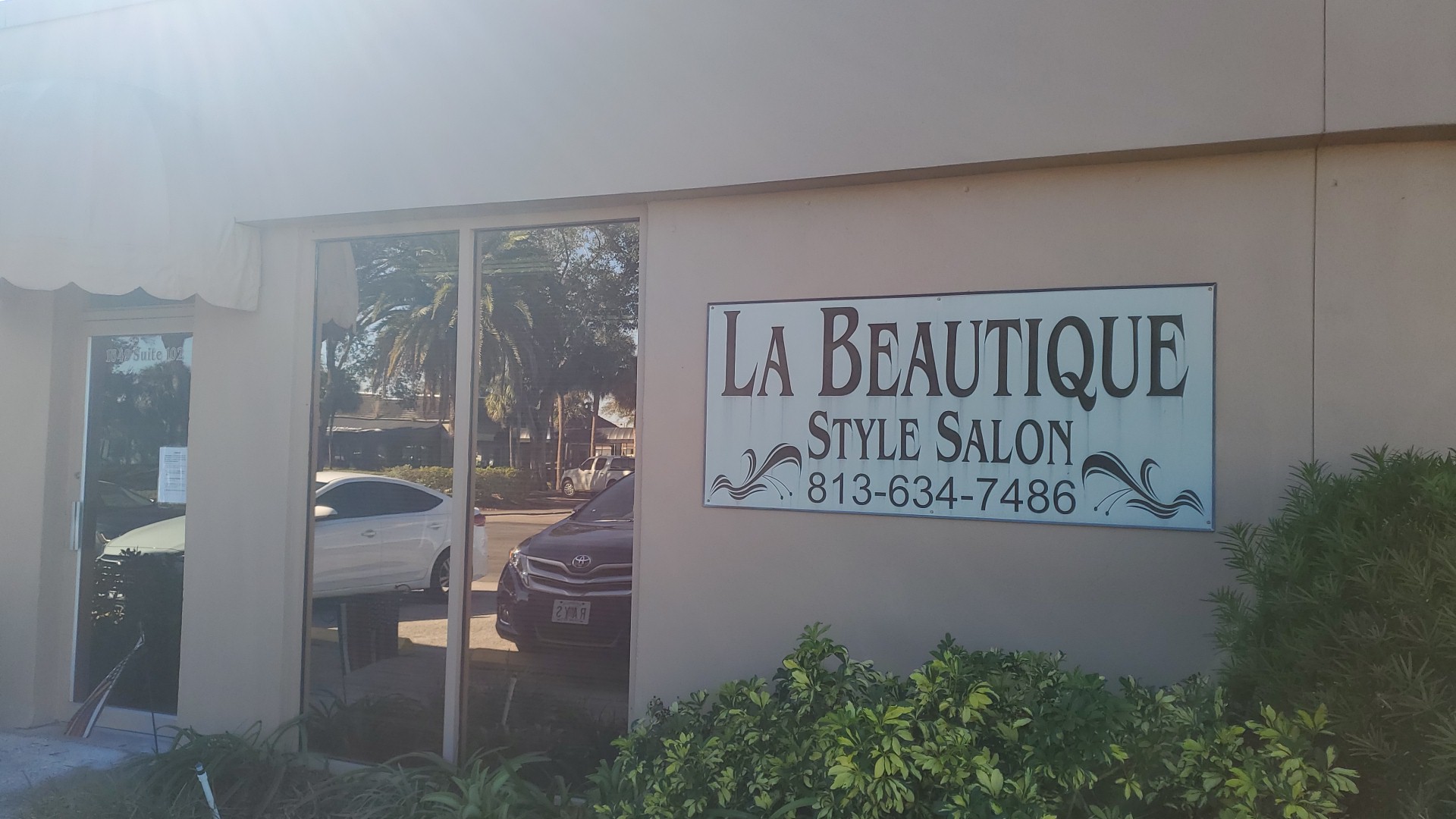 La Beautique Style Salon storefront sign · Sun City Center