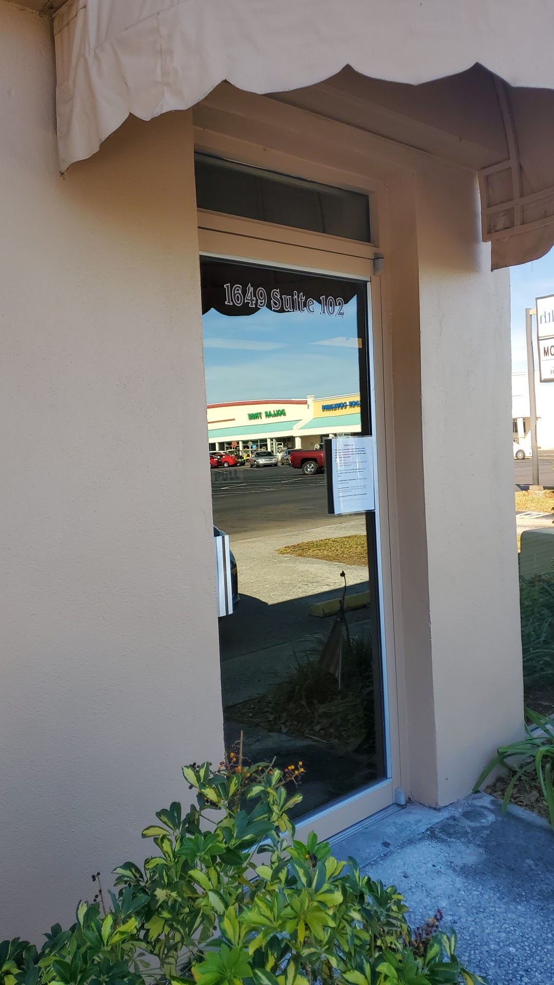 Storefront window 1649 Suite 102