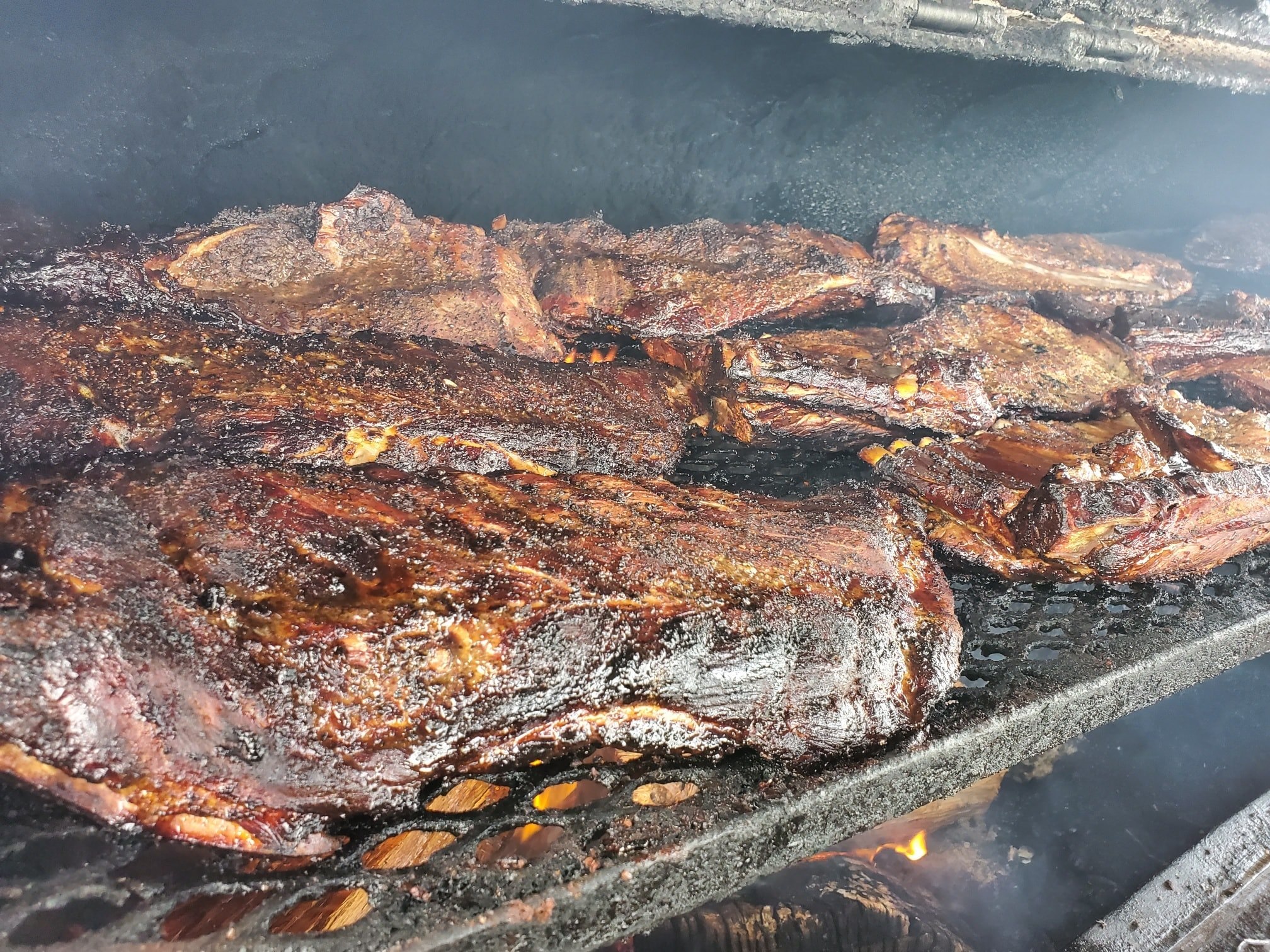 Smoked ribs on smoker grates