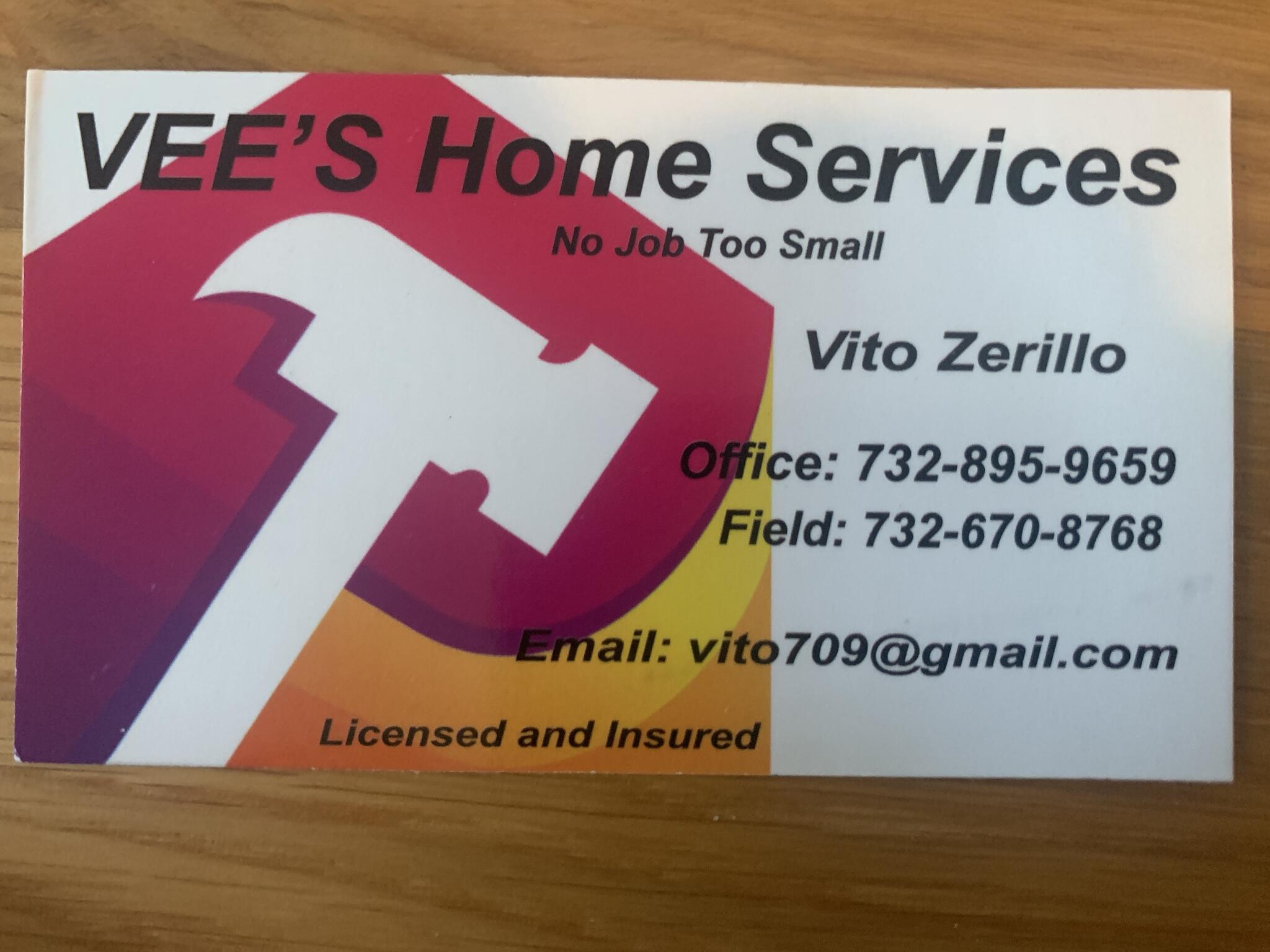 Vee's Home Services business card with hammer logo